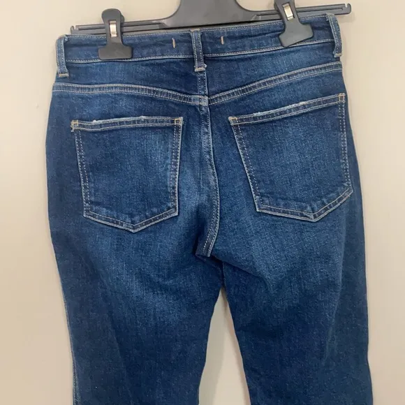 Free People high waisted dark wash straight leg jeans frayed / distressed bottom