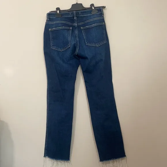 Free People high waisted dark wash straight leg jeans frayed / distressed bottom