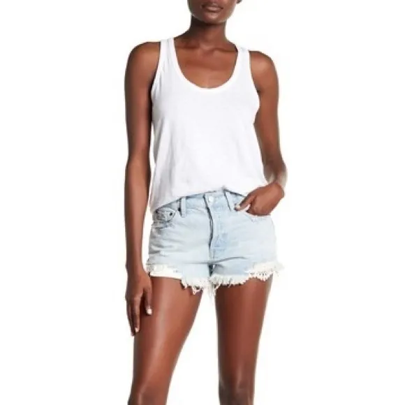 Free people light distressed denim shorts