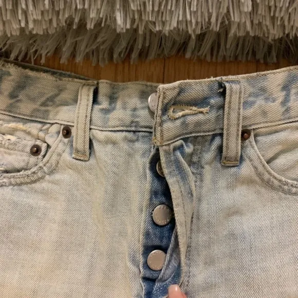Free people light distressed denim shorts
