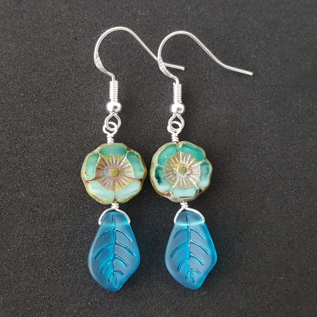 Handmade in Hawaii, Bohemian glass Hawaiian Flower bead with sea glass carved leaf, beautiful earrings with matching necklace in my store