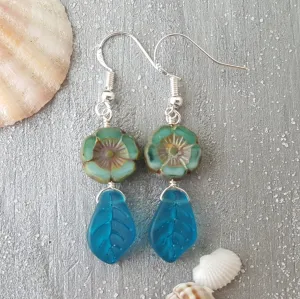 Handmade in Hawaii, Bohemian glass Hawaiian Flower bead with sea glass carved leaf, beautiful earrings with matching necklace in my store