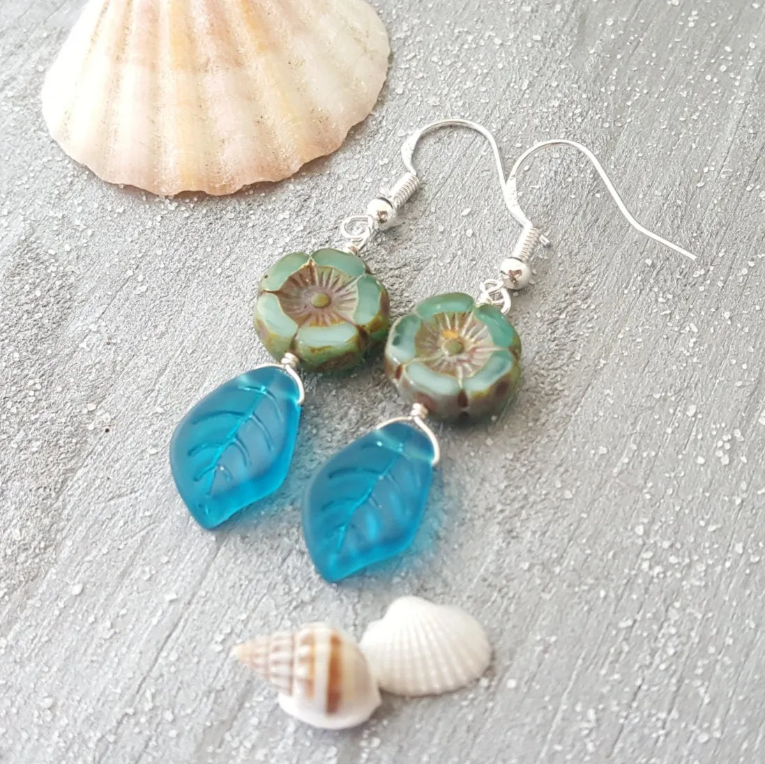 Handmade in Hawaii, Bohemian glass Hawaiian Flower bead with sea glass carved leaf, beautiful earrings with matching necklace in my store