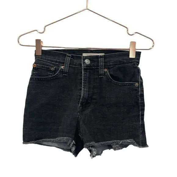 Levi’s black 501 Buttonfly denim high rise cut off shorts.  Size 24