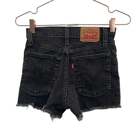 Levi’s black 501 Buttonfly denim high rise cut off shorts.  Size 24