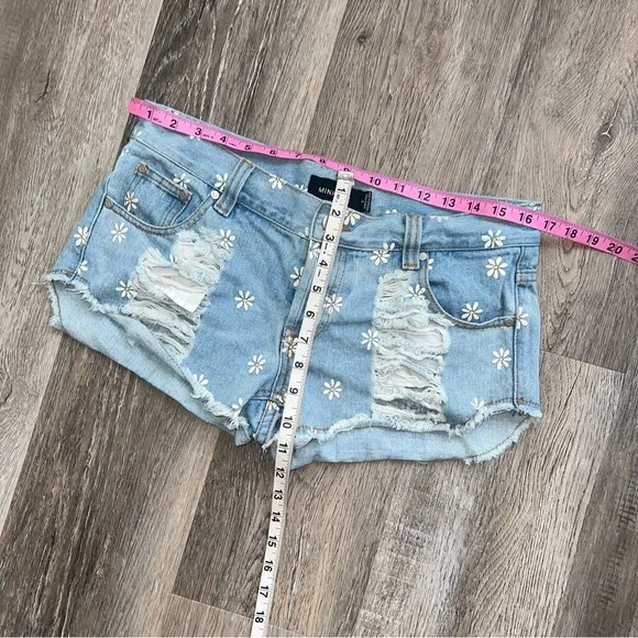 MINKPINK Sugar daisy print distressed denim shorts