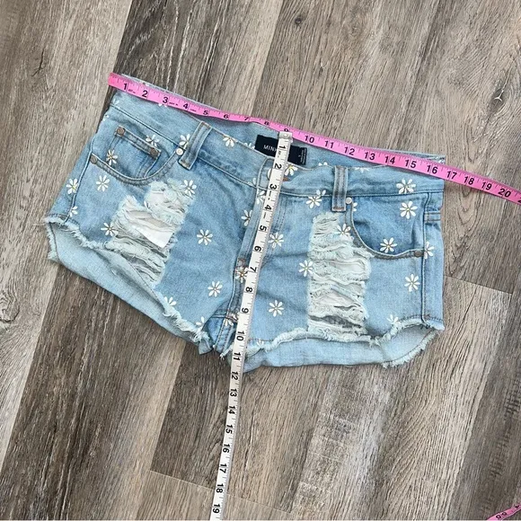 MINKPINK Sugar daisy print distressed denim shorts