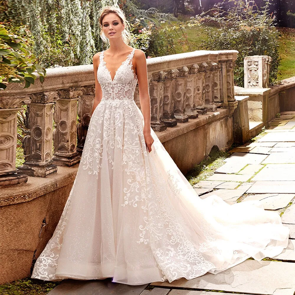 New Arrivals Beaded Appliques Lace Wedding Gowns Robe Mariee Deep V-neck Backless Sleeveless Illusion Sexy Bridal Dress