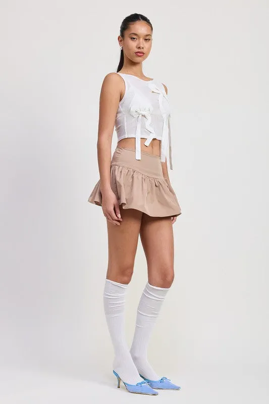 SLEEVELESS SHEER BOW TOP