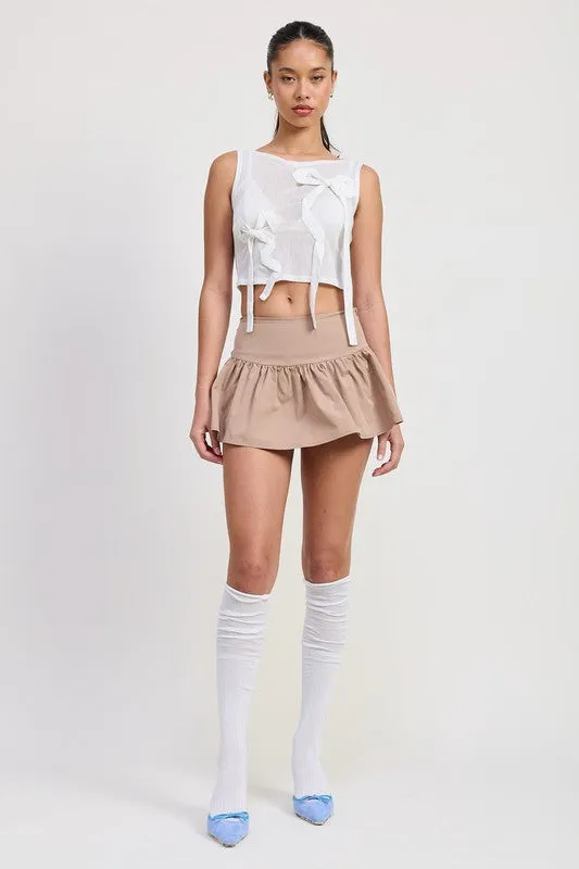 SLEEVELESS SHEER BOW TOP