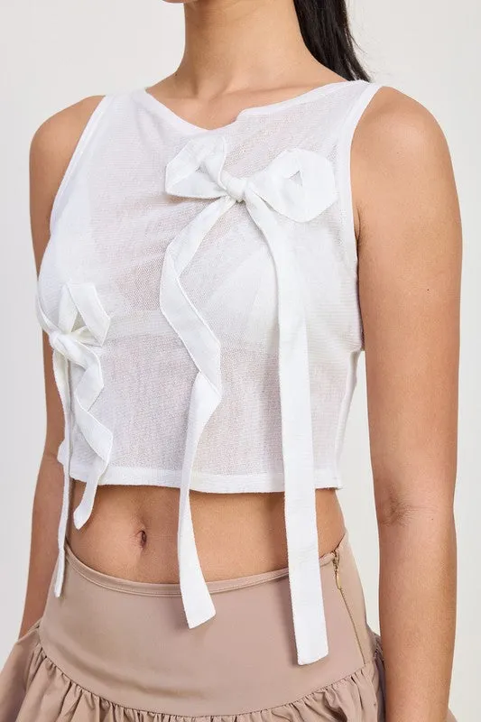 SLEEVELESS SHEER BOW TOP