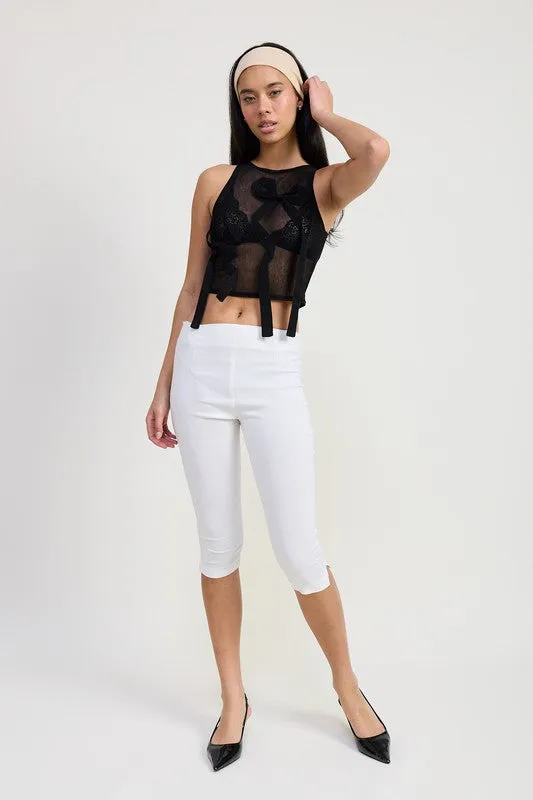 SLEEVELESS SHEER BOW TOP
